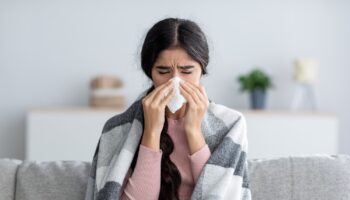 Unhappy,Sad,Young,Indian,Female,In,Plaid,Suffering,From,Fever