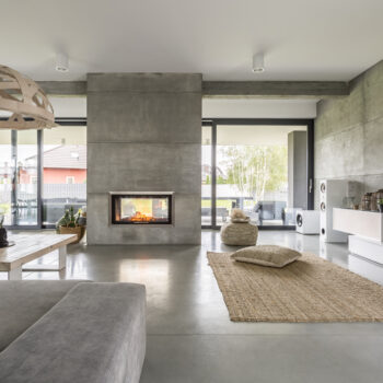 Spacious,Villa,Interior,With,Cement,Wall,Effect,,Fireplace,And,Tv